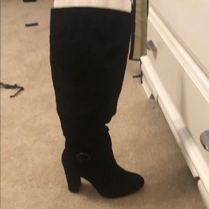Tall heeled suede boots